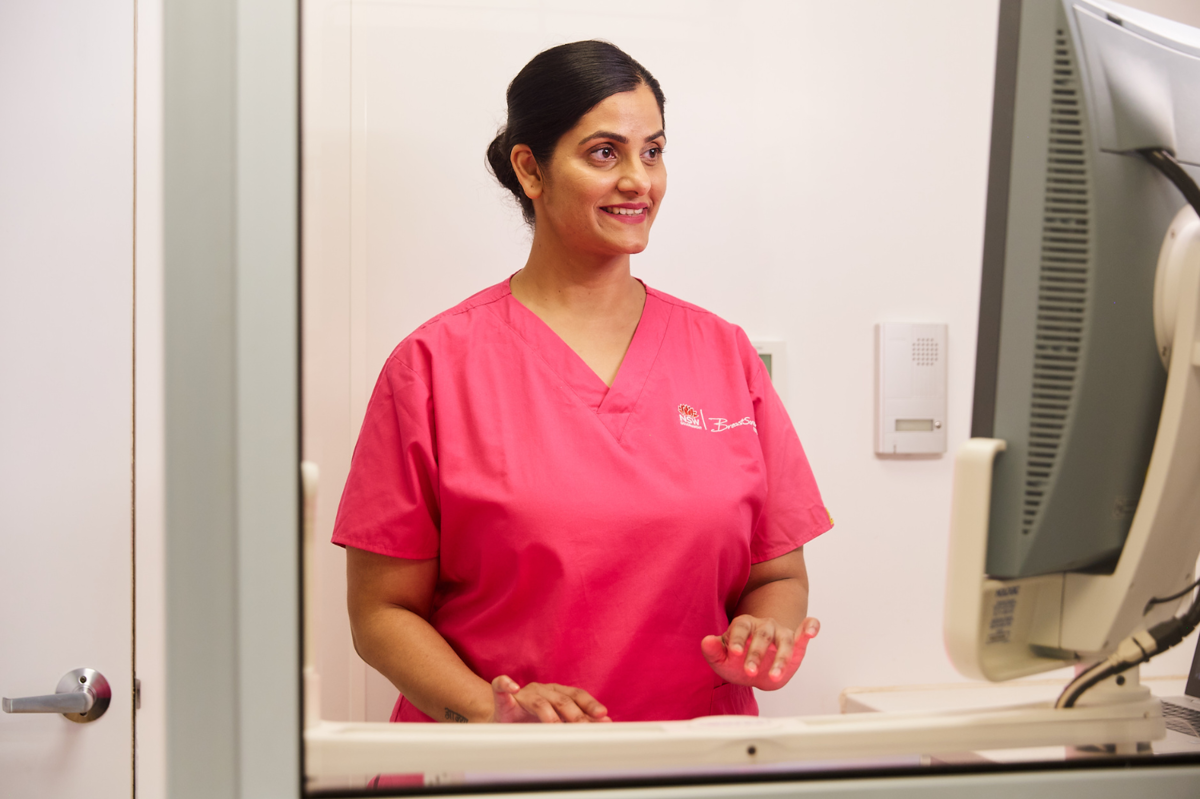Breastscreen NSW Radiographer at the computer